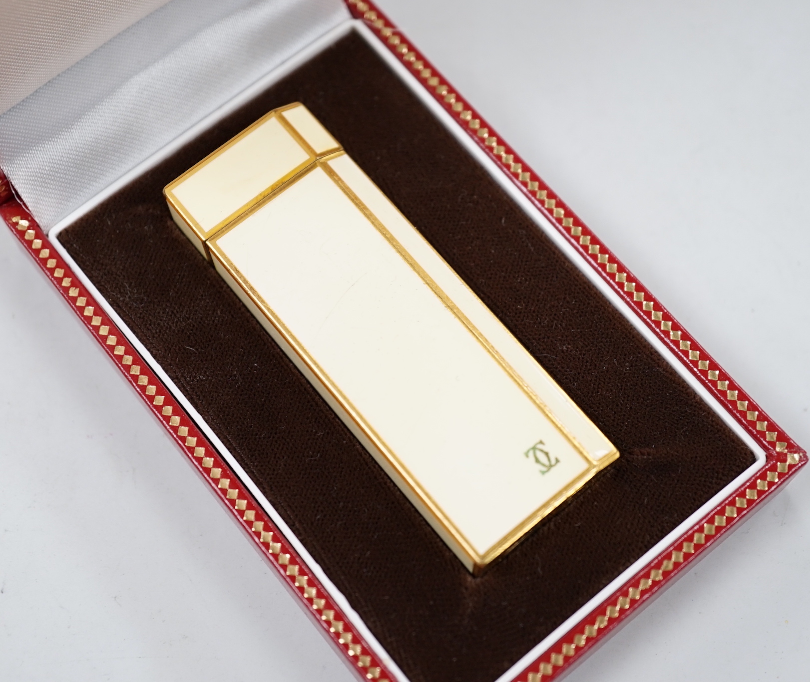 A cased Cartier cigarette lighter